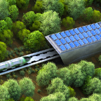 Modern train going through bridge covered with solar panels.